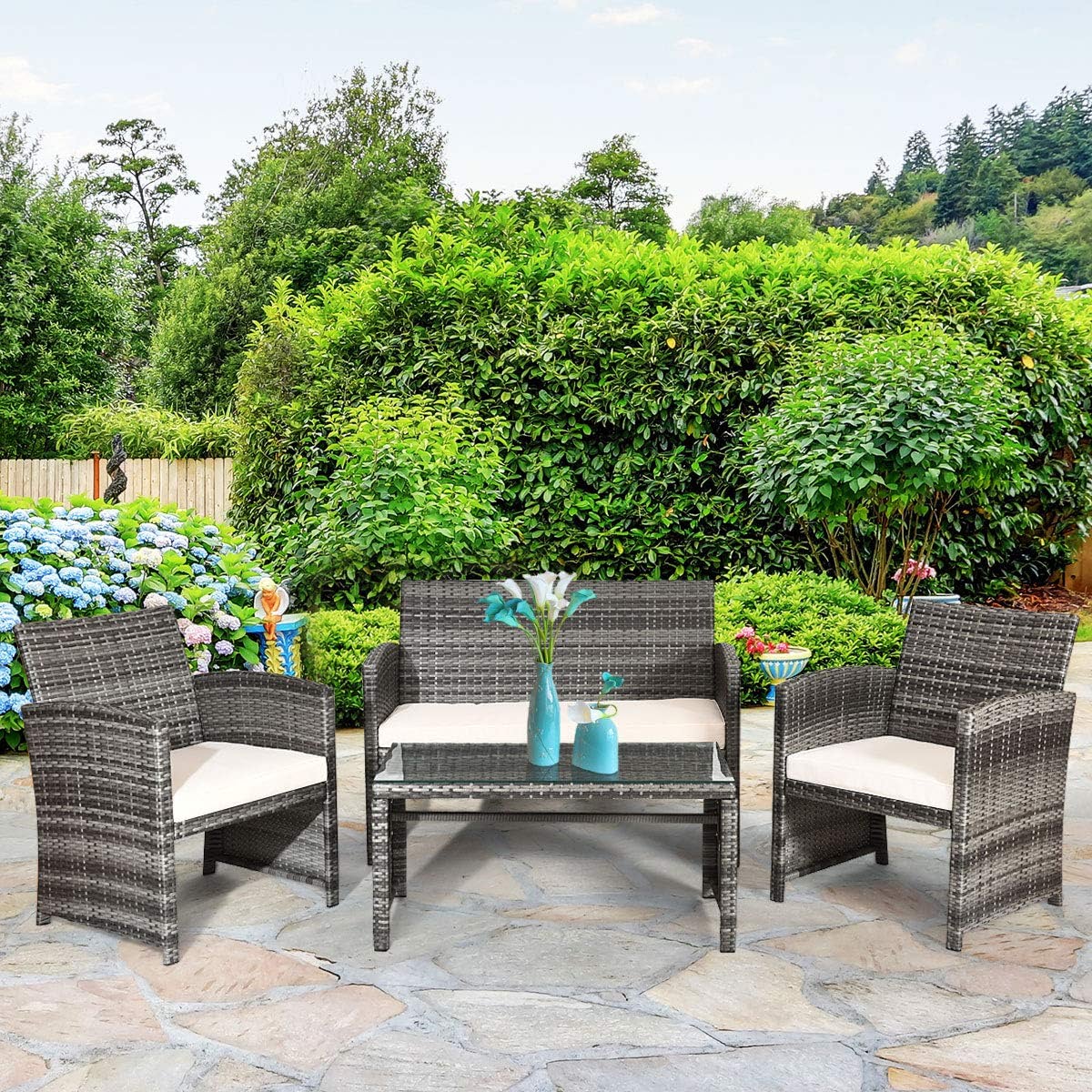 4-Piece Outdoor Wicker Conversation Furniture Set with White Cushions and Tempered Glass Table