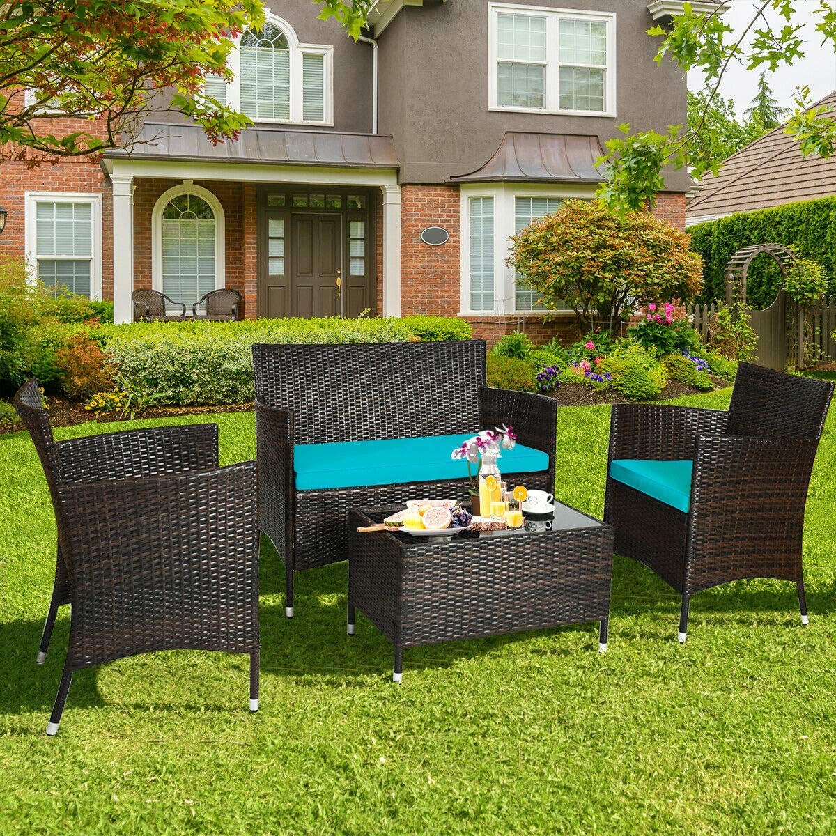 4-Piece Outdoor Wicker Conversation Furniture Set with Turquoise Cushions and Tempered Glass Table