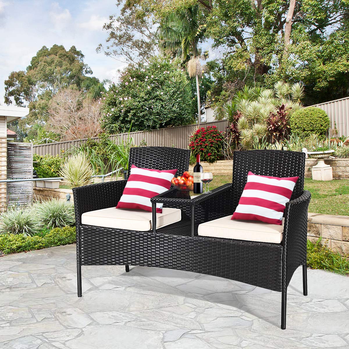Black Wicker Outdoor Loveseat with White Cushions and Center Tea Table