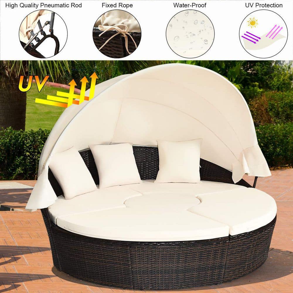 Brown Wicker Outdoor Patio Day Bed with White Cushions and Canopy