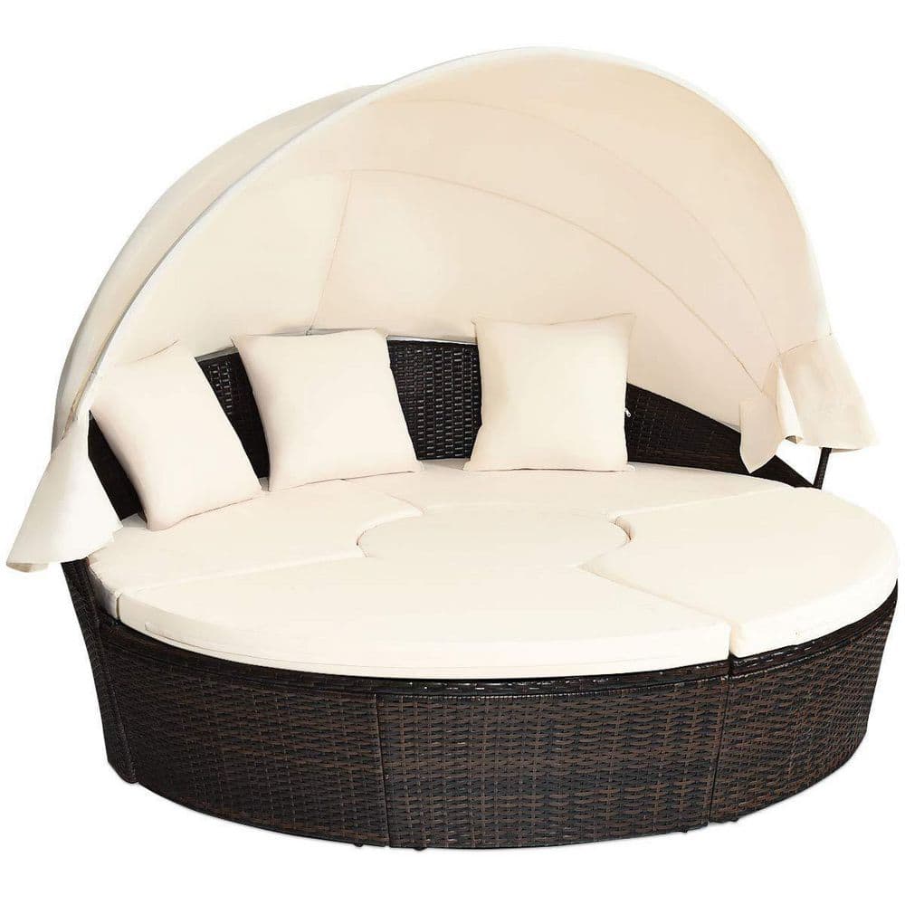 Brown Wicker Outdoor Patio Day Bed with White Cushions and Canopy